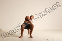 Underwear Gymnastic poses Man Black Muscular Bald Dancing Dynamic poses Academic